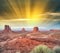 Monument Valley National Park buttes on a beautiful summer sunset