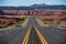 Monument Valley Road. Rural asphalt road among the fields in summer season.