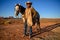 Monument Valley, Utah, USA, November 3rd, 2019, Native Navajo wearing traditional American cowboy with horses