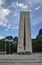 Monument of World War II with wreaths in Komotini, East Macedonia, Greece.  Impressive tall stone tower with a sword