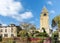 Monumental church tower on the island Ile Barbe in the Saone, in