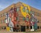 Monumental mural by artist Haylee Ryan Yale on a medical office building at Valoris Health Park in Garland, Texas.