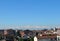 Monviso mountain in Piedmont Italy. Small town against snow-capped mountain.