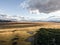 Moody evening sunset aerial high angle drone view of the grassland plain near Lake Tekapo in the Canterbury Region of New Zealand