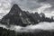 Moody picture of Cadin di Misurina mountains, covered in clouds in bad weather. Cortina d`Ampezzo, Italy