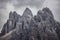 Moody picture of Cadin di Misurina mountains, covered in clouds in bad weather. Cortina d`Ampezzo, Italy