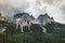 Moody picture of Cadin di Misurina mountains, covered in clouds in bad weather. Cortina d`Ampezzo, Italy