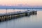 Moody twilight over pier in gdynia orlowo on Baltic sea in poland