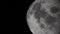 Moon against the background of space with illuminated craters and lunar soil