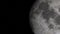 Moon against the background of space with illuminated craters and lunar soil