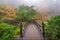 Moon Bridge in Portland Japanese Garden One Colorful Foggy Autumn Morning