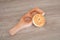 A moon cake and a wooden mold on the table.Chinese characters on the moon cake mean `Black sesame`