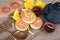 Moon cakes and a pot of tea and moon cake molds and golden chrysanthemums placed on the table.Chinese characters on the moon cake