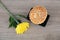 Moon cakes and a yellow chrysanthemum on the table.Chinese characters on the moon cake mean `Five kinds of nuts`