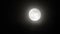 Moon with clouds in the night sky. Cloudy weather on a autumn night. Mysterious night sky with moon. Spooky night and mystery. Dr