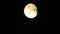 Moon with clouds in the night sky. Cloudy weather on a autumn night. Mysterious night sky with moon. Spooky night and mystery. Dr