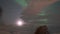 The moon, the clouds and the Northern Lights near Tromso, Norway, Arctic