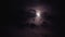 Moon with clouds passing in front and fog