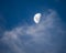 Moon Coming Out of Slightly Pink Cirrus Clouds