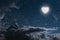 moon heart-shaped shines over the lovers' house on valentine's day