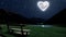 a moon heart-shaped shines over sea on valentine\'s day