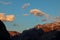 The moon hiding behind the mountains in Hallstatt