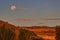 Moon Over Black Ridge Canyons at Sunrise