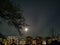 The moon over Houses at the night sky in Vladivostok