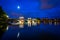 The moon over the John W Weeks Bridge and Charles River at night