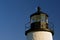 Moon rise over a historic New england Lighthouse