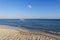 Moon rising over the Red Sea in Egypt just before sunset