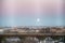 The Moon sets behind the elevated portion of the Brooklyn Queens Expressway