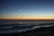 Moon setting above islands in Adriatic sea