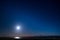 The Moon shining above the Cumbrian coast & Anthorn Radio Station taken from Powfoot