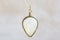 moon stone sterling silver simple pendant on neutral background