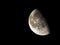 Moon surface showing 62 percent illuminated waning gibbous lunar phase