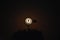 Moon thru a windmill in Fort Worth Texas.