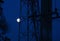 Moon under telecommunication tower