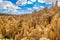 Moon Valley or Valle De La Luna eroded sandstone spikes panorama near La Paz, Bolivia