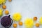 Mooncakes, tea, chrysanthemum flowers on grey background with copy space. Chinese mid-autumn festival food.