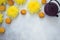 Mooncakes, tea, chrysanthemum flowers on grey background with copy space. Chinese mid-autumn festival food.