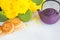 Mooncakes, teapot, chrysanthemum flowers, lotus seeds in pods on white background. Chinese mid-autumn festival food.