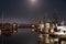Moonlight on fishing boats in dock