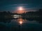 Moonlight over a lake with a castle. Night mystical scenery. Full moon over foggy pond