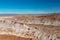 Moonlike landscape of dunes, rugged mountains and geological rock formations of Valle de la Luna Moon valley in Atacama desert,