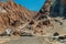 Moonlike landscape of dunes, rugged mountains and geological rock formations of Valle de la Luna Moon valley in Atacama desert,