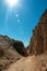 Moonlike landscape of dunes, rugged mountains and geological rock formations of Valle de la Luna Moon valley in Atacama desert,