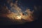 Moonlit clouds at night in the mountains