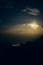 Moonlit clouds at night in the mountains