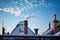 moonlit snowy rooftop with chimney and rising smoke silhouette